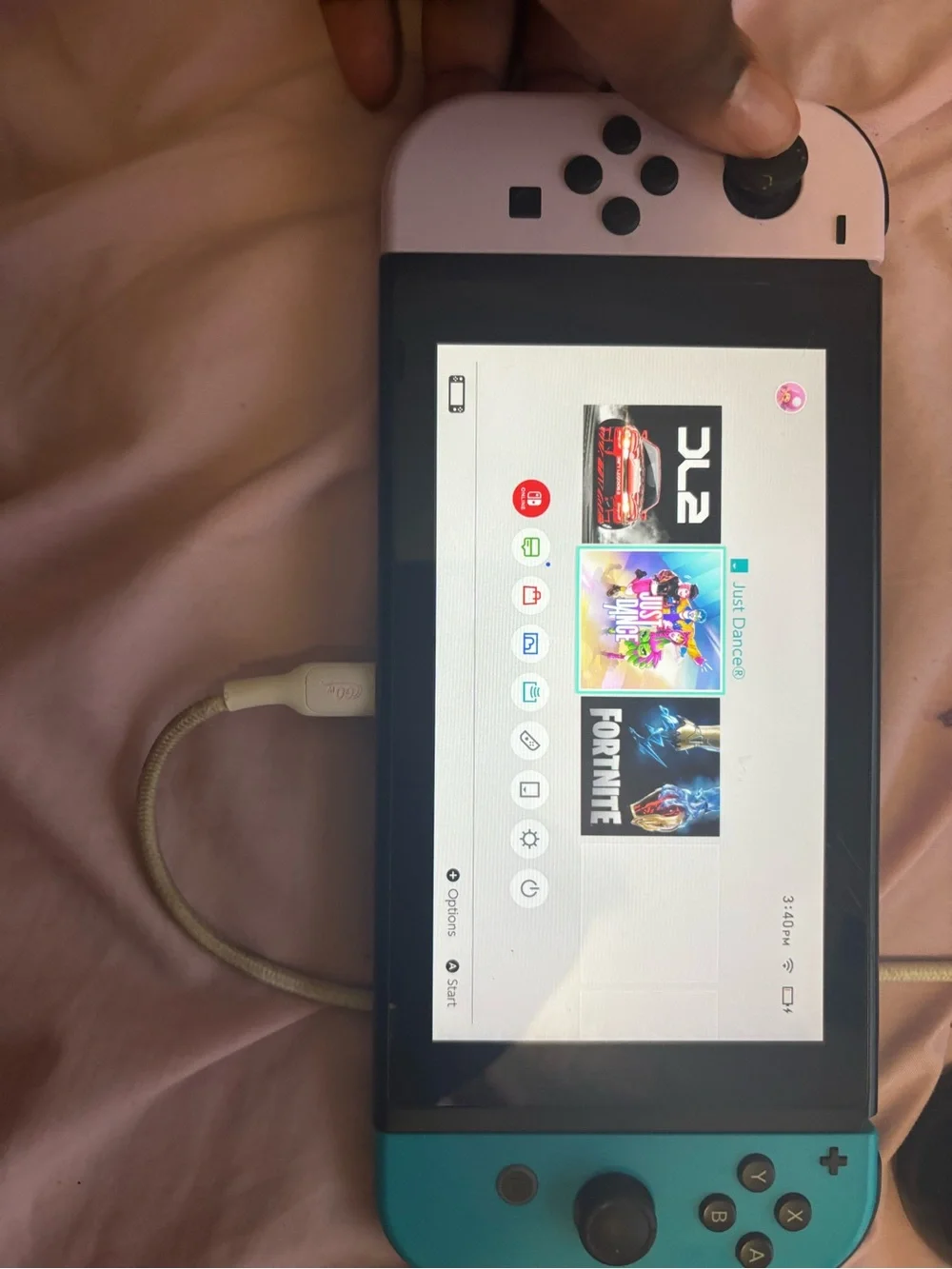 Fully workingNintendo Switch with White Left Joy-Con and Turquoise Right Joy-Con